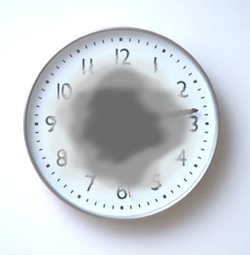 Image Of A Clock Depicting Macular Degeneration Symptoms In An Eye Exam In Brooklyn, NY - Brighton Eye Associates